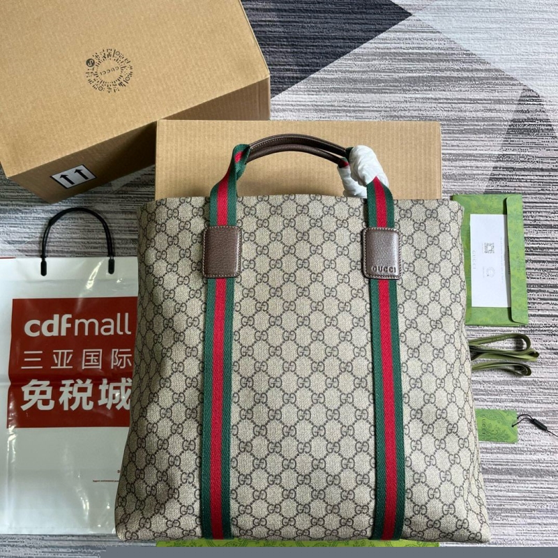 G*u*i shopping bags